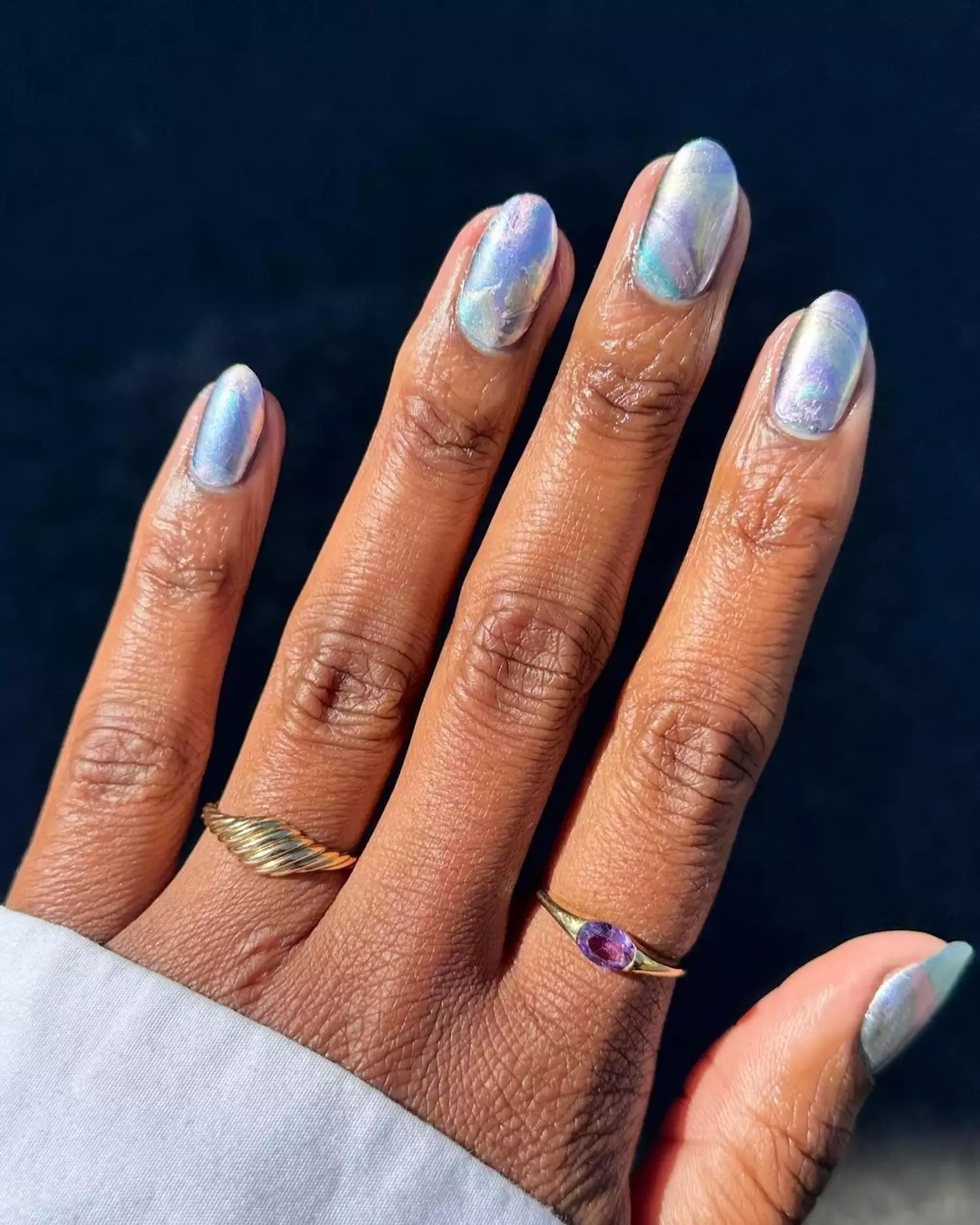 A chrome marble manicure