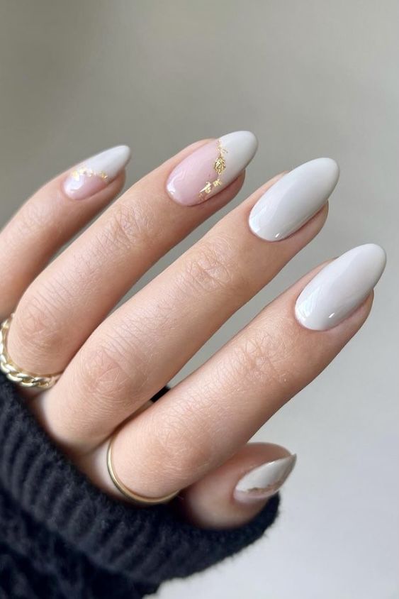 White Nails with design and gold detail