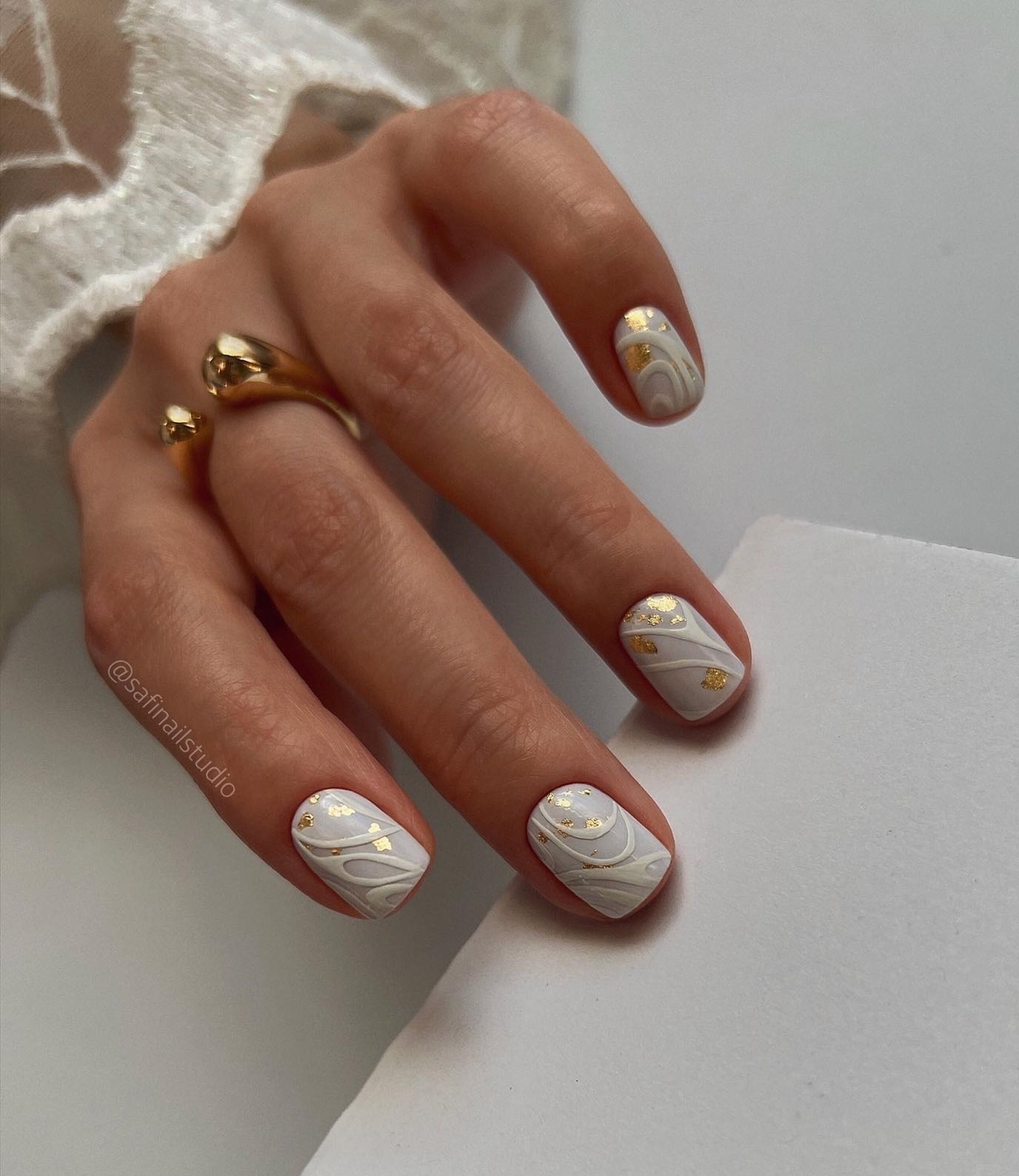 White and Gold Nail Design