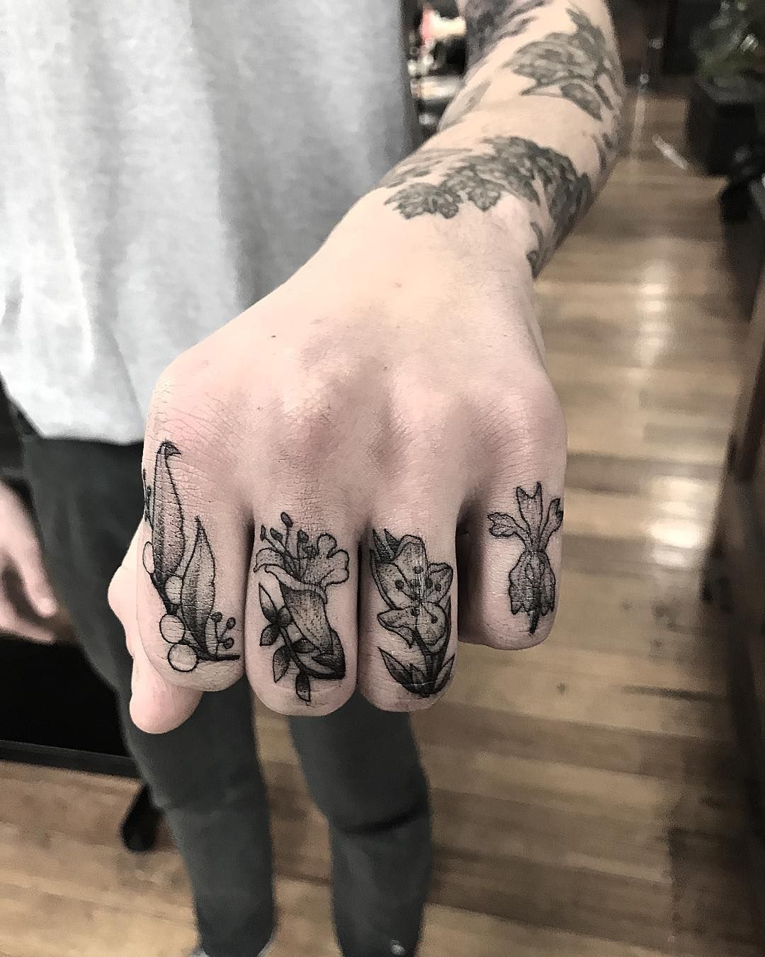 Floral Knuckle Tattoos by Annita Maslov | Knuckle tattoos, Finger tattoos,  Small tattoos for guys