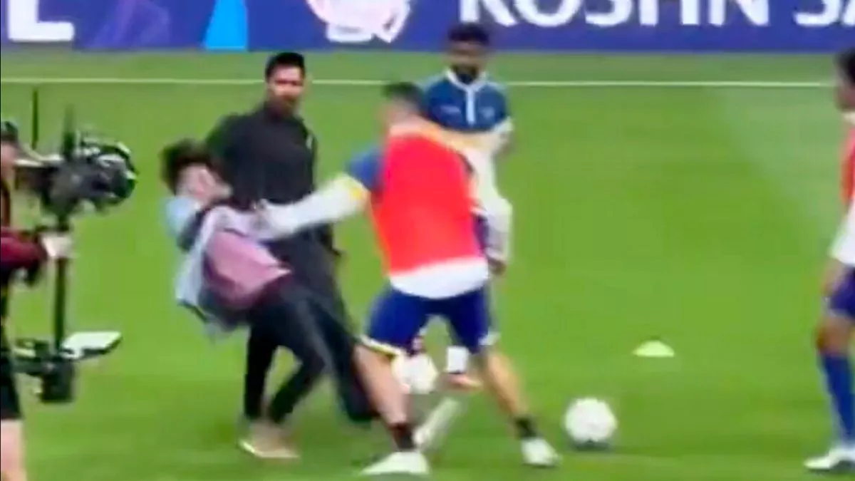 Cristiano Ronaldo narrowly avoids injury as pitch invader almost takes him  out - Daily Star