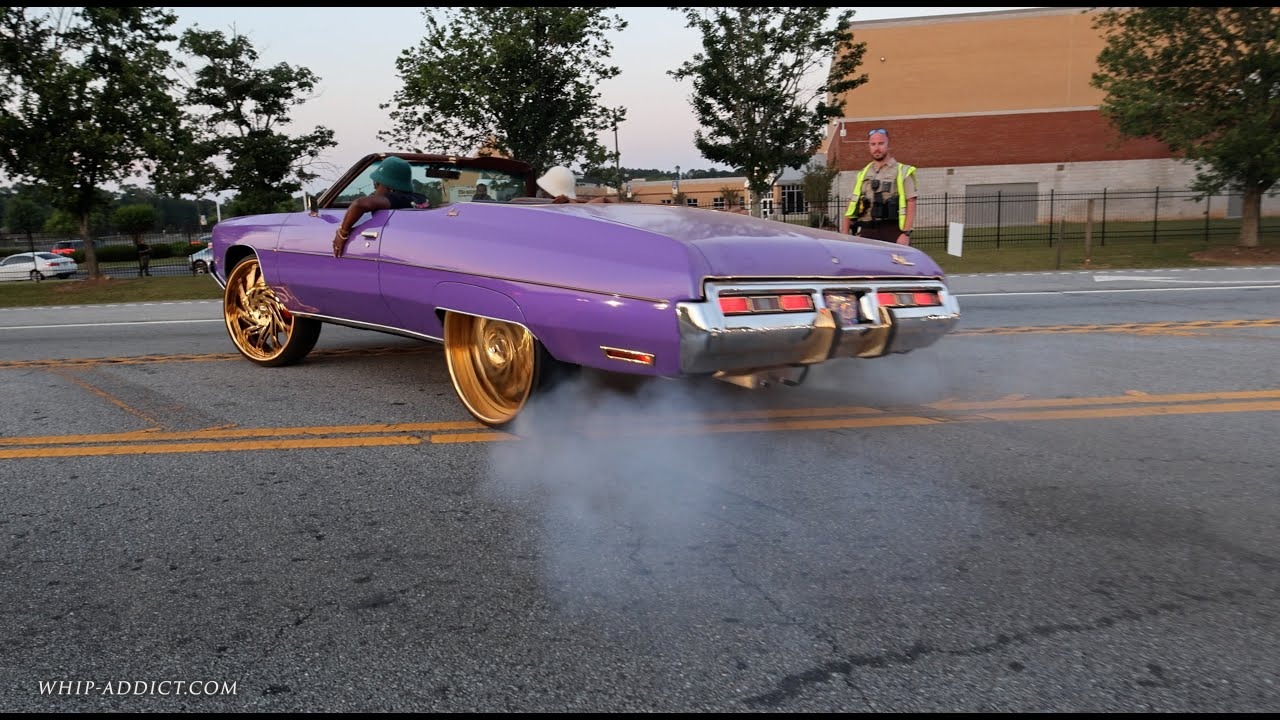 Rick Ross shows off his unique purple supercar at the auto show. WoWwwwwwwwwwwwwww!