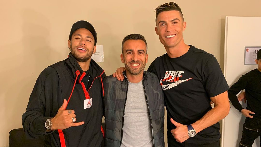 Ronaldo and Neymar pose with Ricardo Regufe, a close friend of the Juventus star