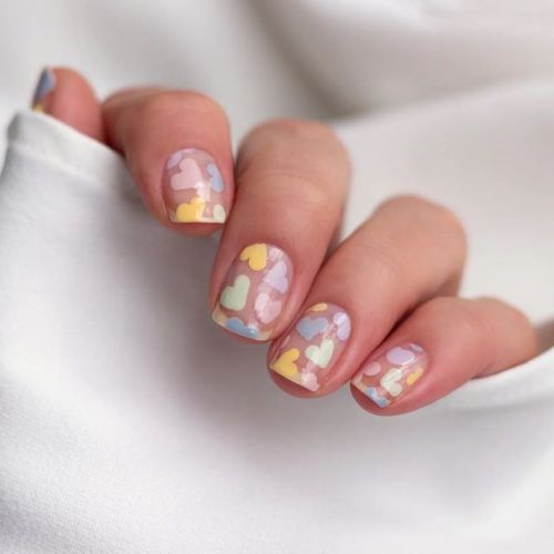 nail art with pastel hearts