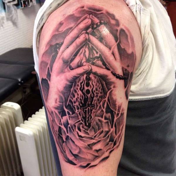 praying hands sleeve tattoo