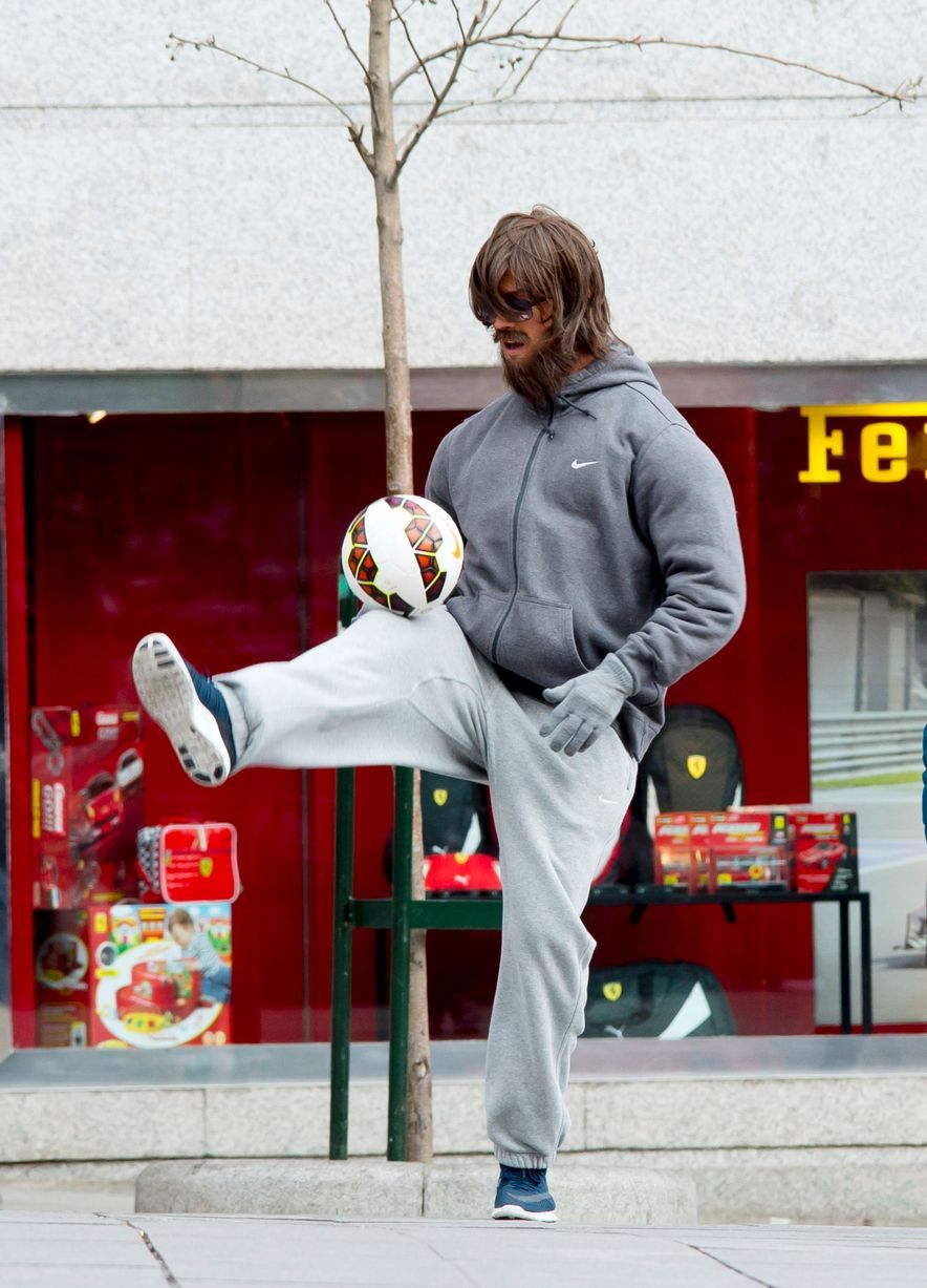 Cristiano Ronaldo, disguised as beggar, plays football with young boy in  Madrid square | Cristiano ronaldo, Ronaldo, Football