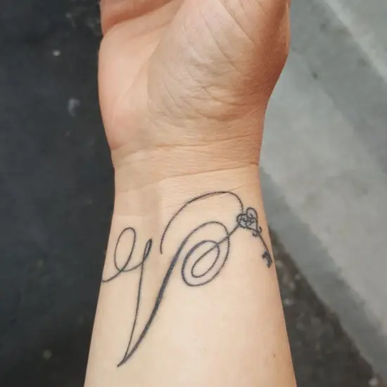 V Letter Tattoo Designs on Hand