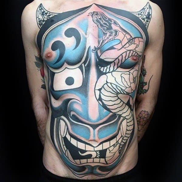 Face tattoo on chest for men