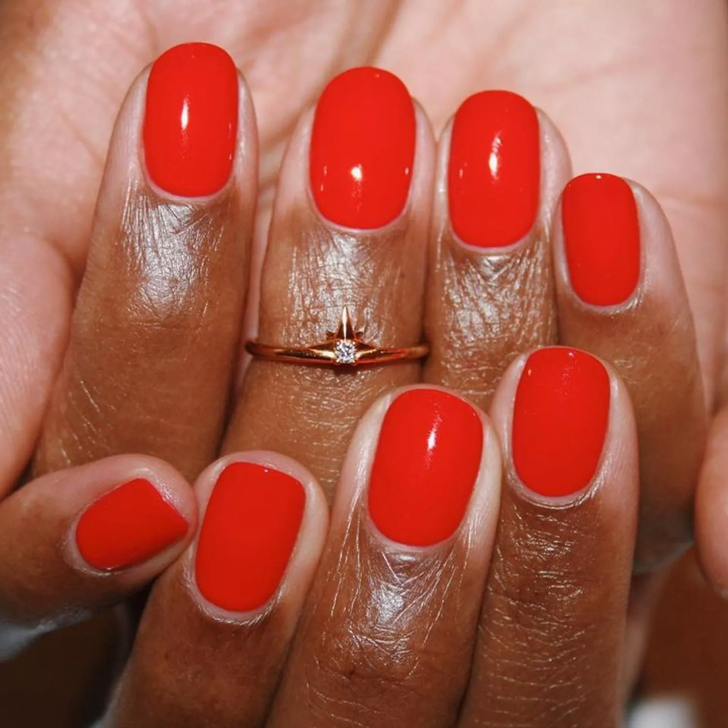 Glossy red nails