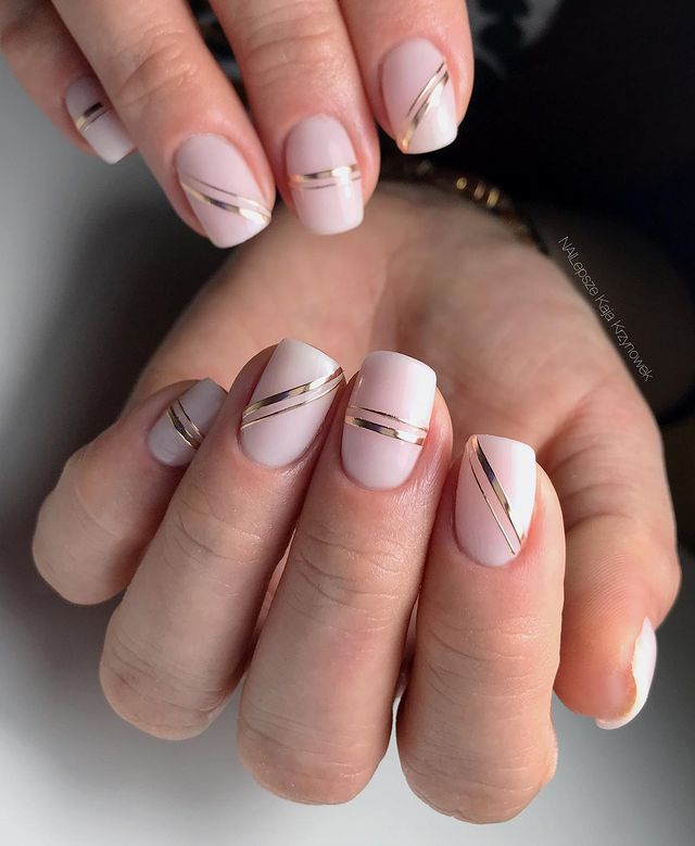 Nude Nails with Golden Stripes