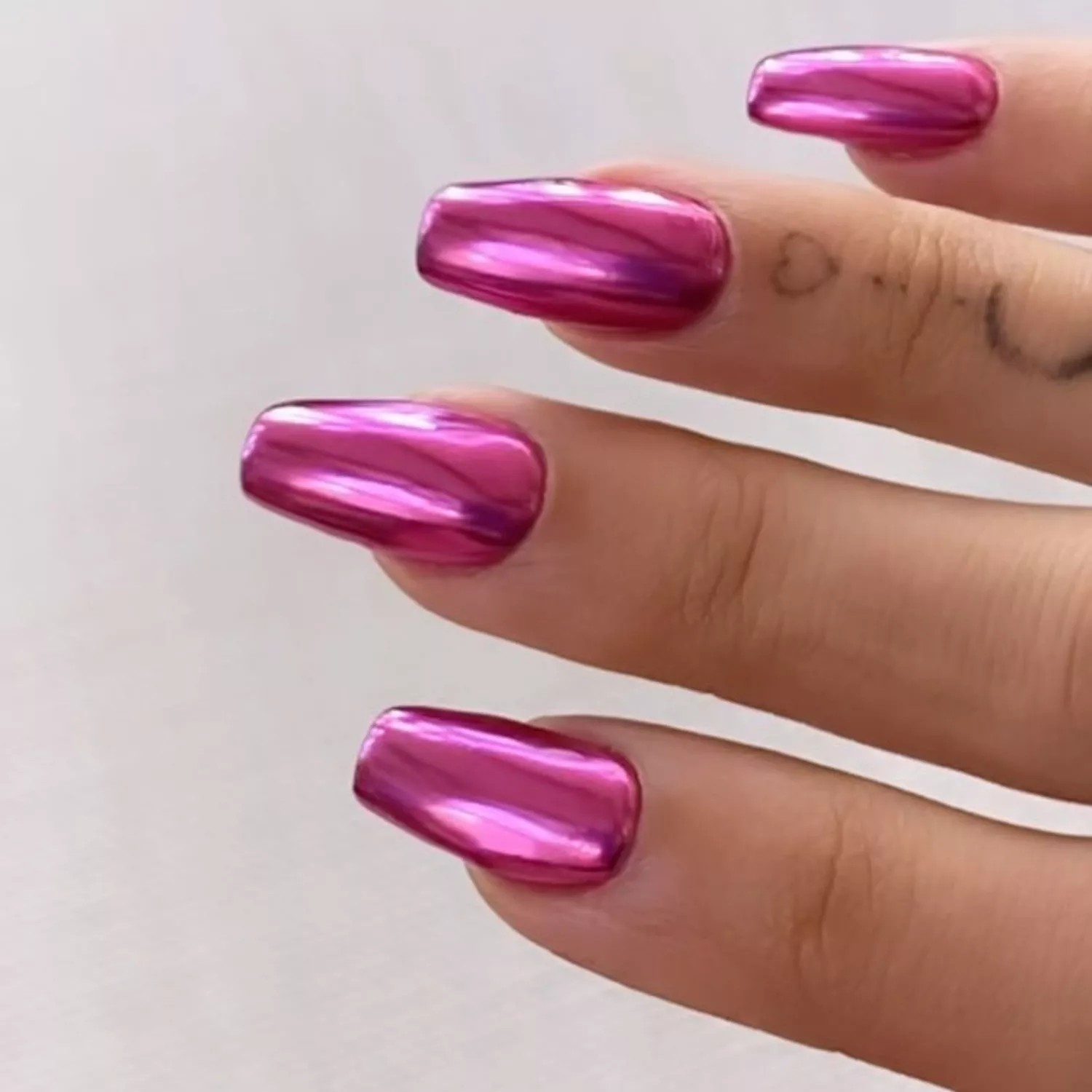 Pink chrome nails