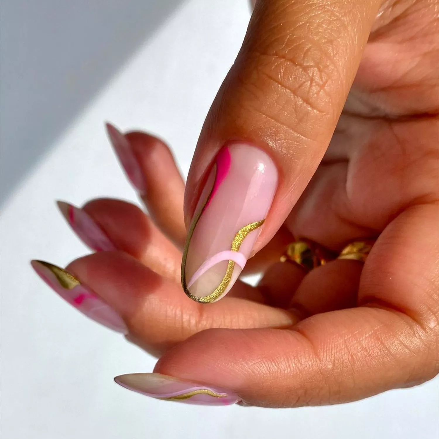 Minimalist Pink and Gold Swirls Manicure