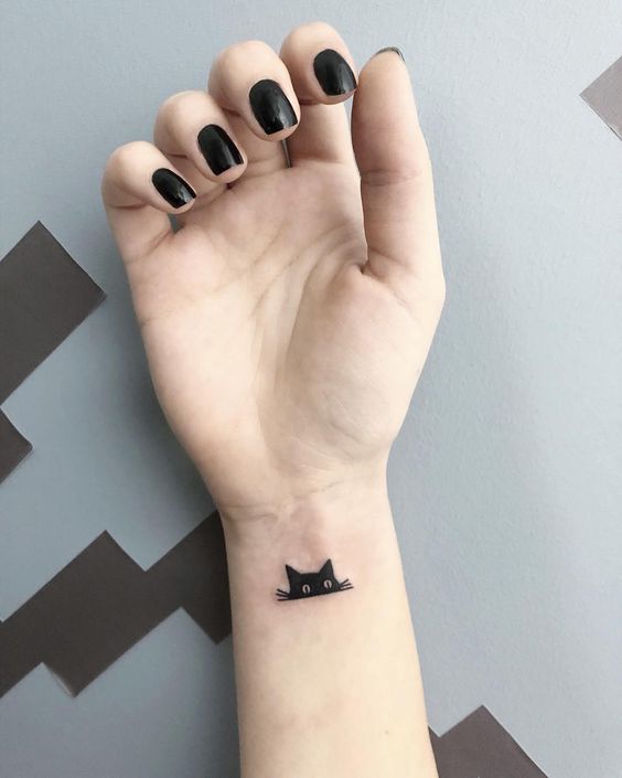 Cat Eye Tattoo on wrist