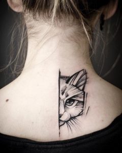 Cat Eye Tattoo on back