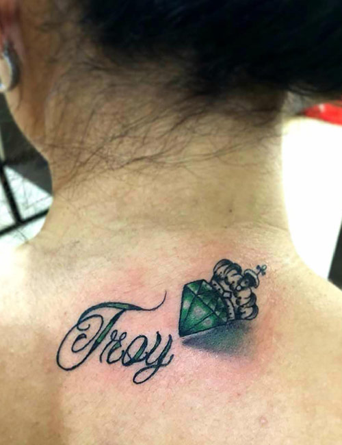 Name Tattoo With A Jewel On It