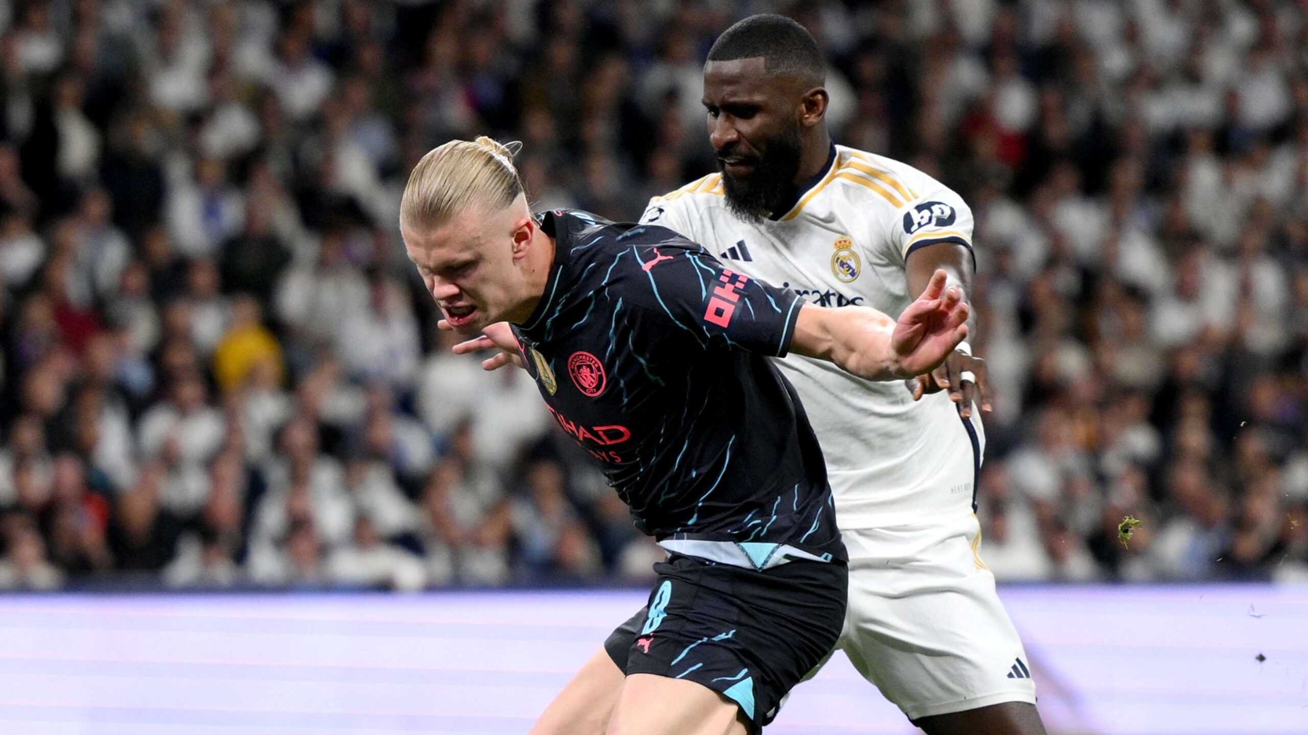 VIDEO? Erling Haaland accidentally smacked in the face by referee during half-time of Man City's Champions League clash with Real Madrid | Goal.com