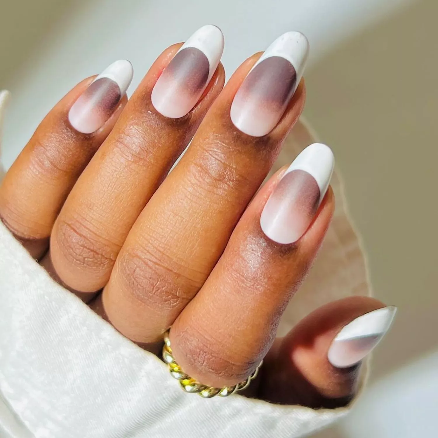 a marshmallow ombre french manicure with white tips