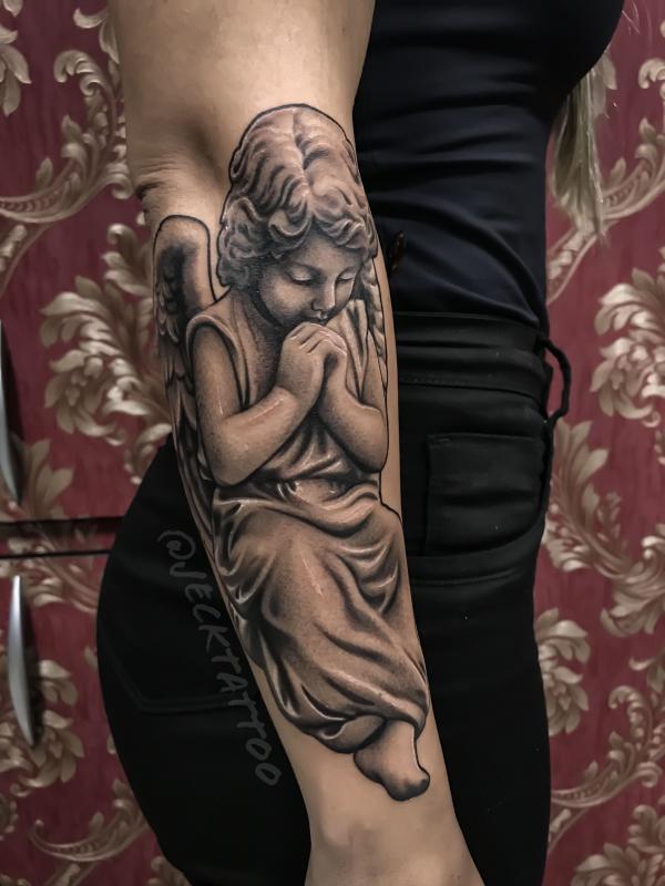 Cherub Guardian angel tattoo forearm