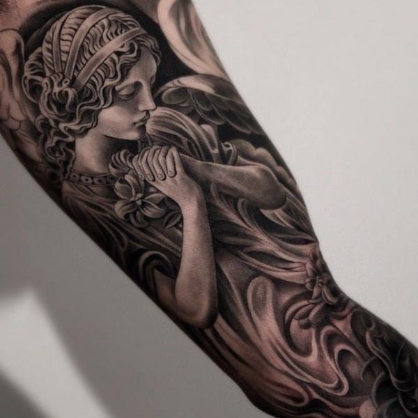 Forearm guardian angel tattoo