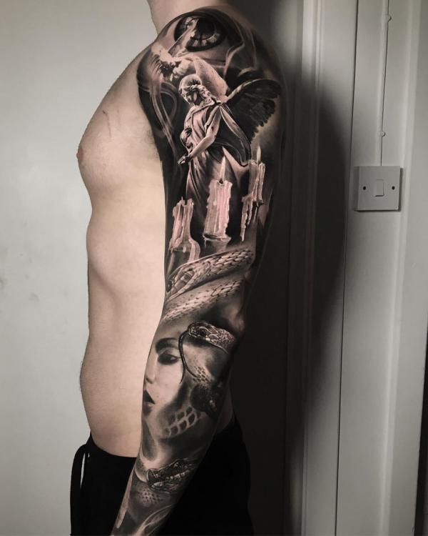 Guardian angel and snake tattoo sleeve