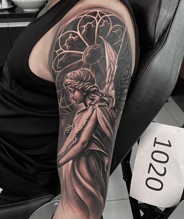 Half sleeve Guardian angel tattoo