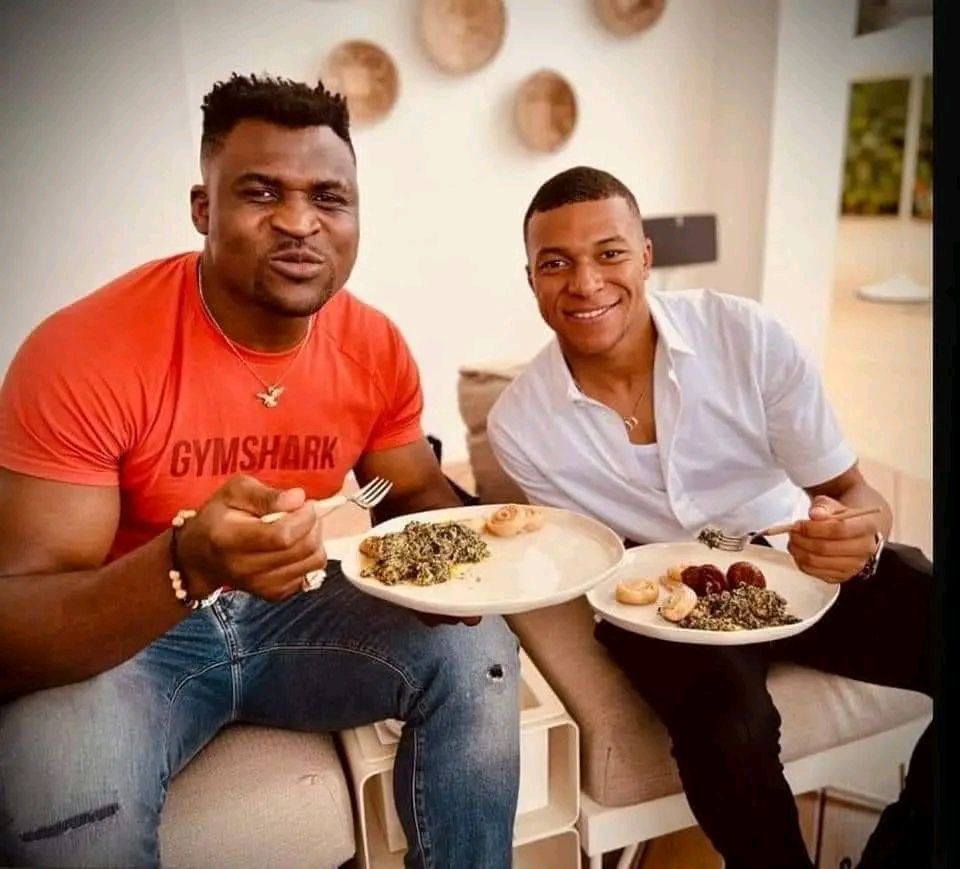 When two sports gurus meet: Kylian Mbappe shares meal with former mixed  martial artist Francis Ngannou. - Mimi Mefo Info