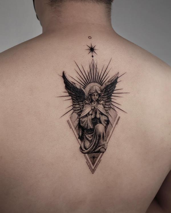 Small praying Guardian angel tattoo