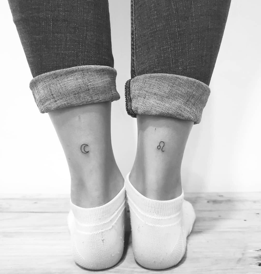 Leo zodiac symbol and moon tattoo located on the ankle