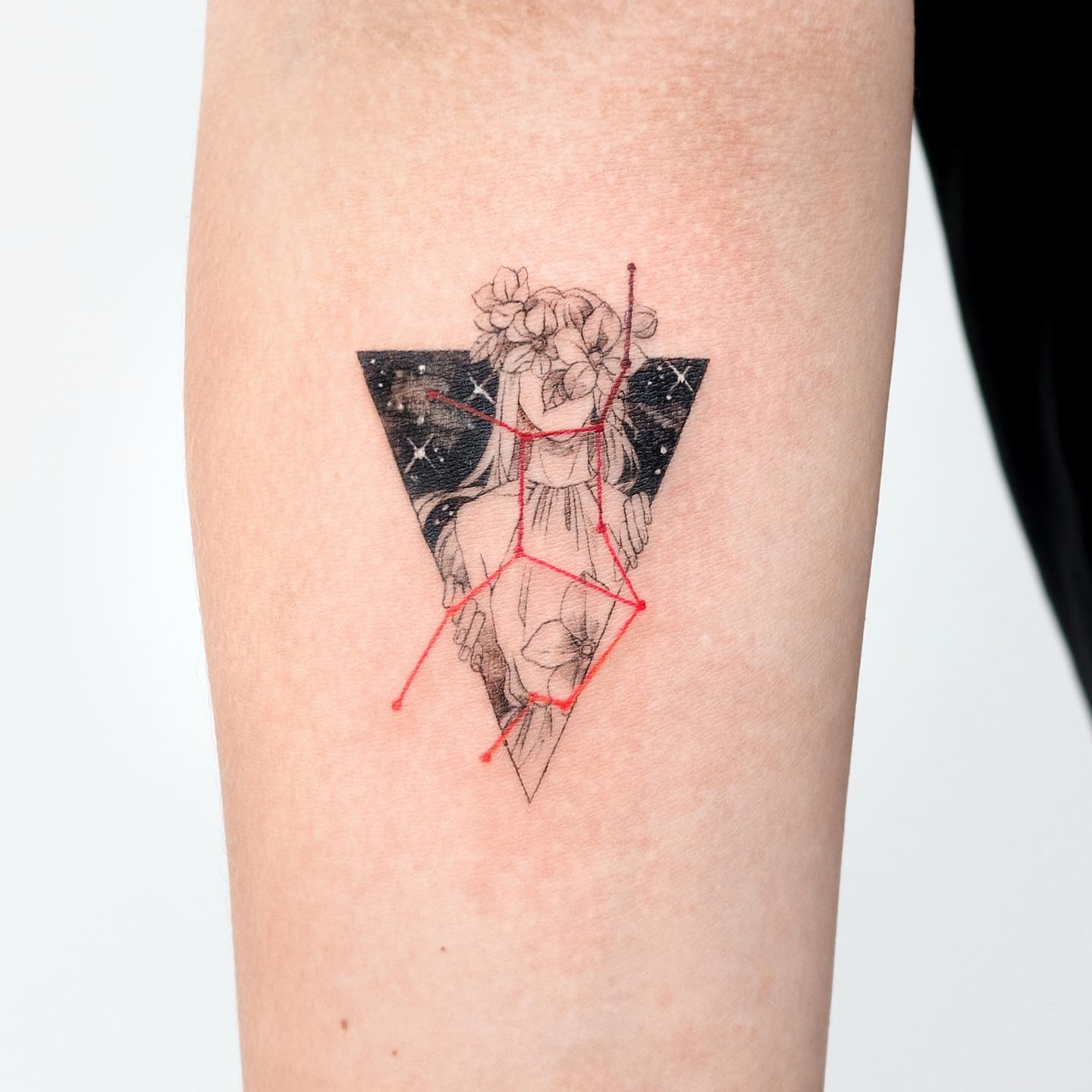 Virgo lady and constellation tattoo on the inner forearm