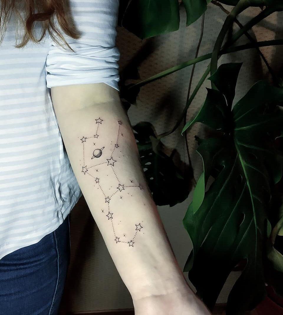 Fine line Virgo constellation tattoo on the inner forearm