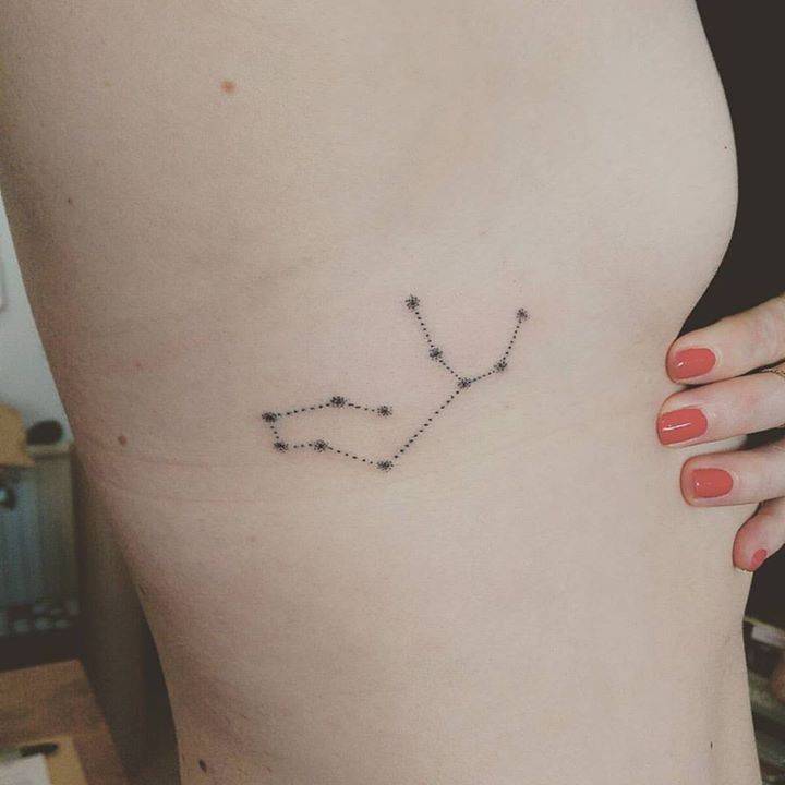 Minimalist Virgo constellation tattoo on the right side ribcage
