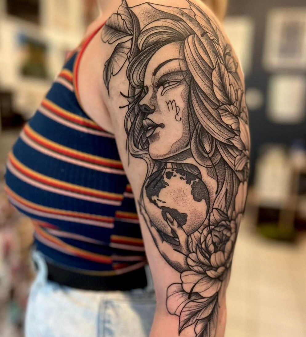 Virgo goddess tattoo on the arm