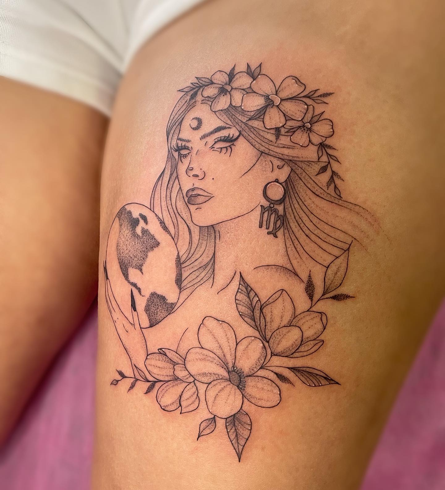 Virgo goddess tattoo on the thigh