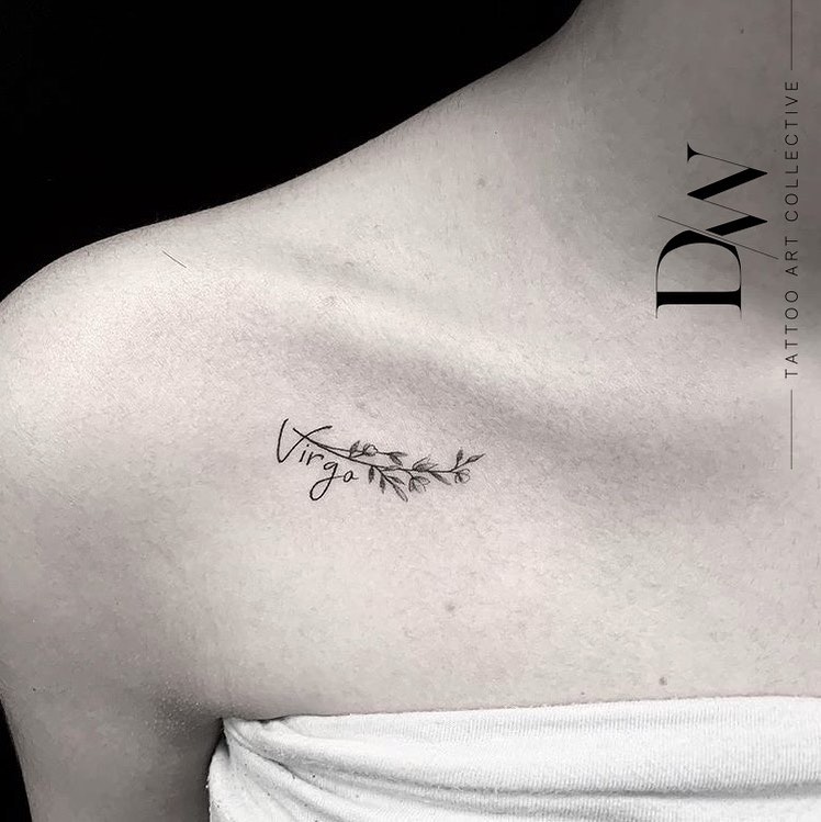 Virgo lettering and flower tattoo on the collarbone