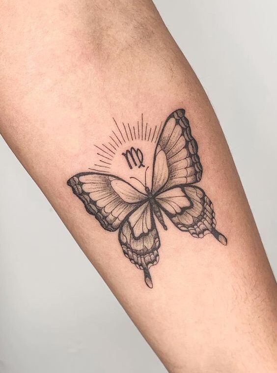 Virgo zodiac sign and butterfly tattoo on the inner forearm
