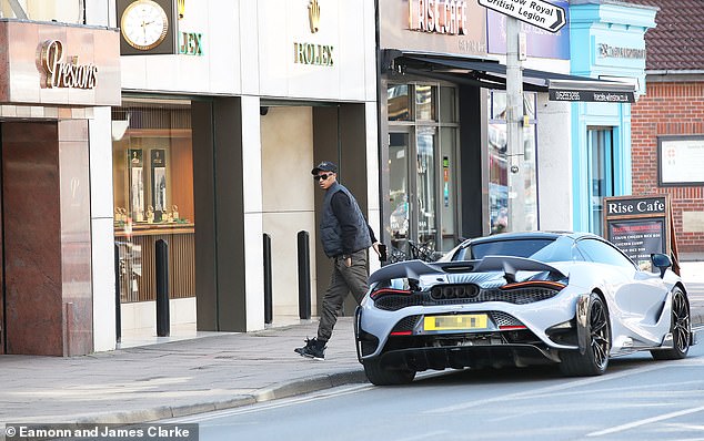 The 25-year-old sported a casual look as he headed inside the luxury watch shop