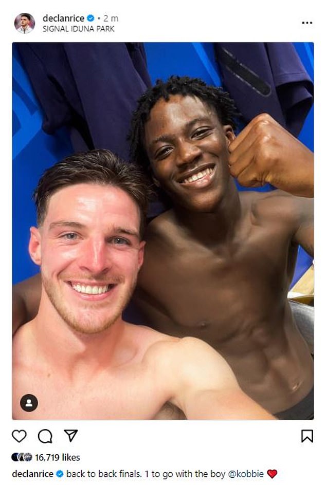 Mainoo beams with delight after England's win with fellow midfielder Declan Rice