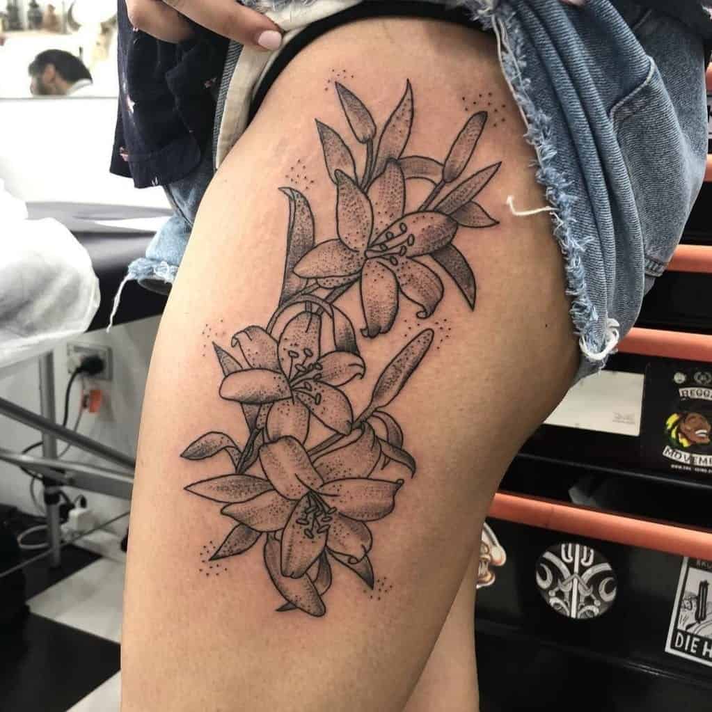 Giant Lily Tattoo On Thigh